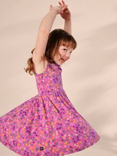 New style! We've put a warm weather spin on our popular Ballet Dress, which we've made sleeveless for balmy summer days. Our artists created this special floral print after visiting Malindi, where spectacular wildflowers grow in Kenya's famed beach town. So twirly and swirly, this bestseller is so fun to wear! A flattering fitted bodice pairs beautifully with the balletic circle skirt. Made of 95% soft cotton, with a dash of Spandex for a little stretch. Below mid-thigh length. Dress Romper Outfit, Ballet Dress, Romper Outfit, Outerwear Outfit, Tea Collection, Beach Town, Circle Skirt, New Arrival Dress, Dress Romper