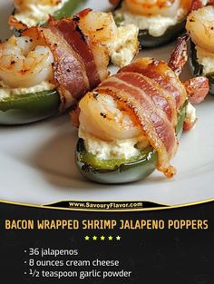 bacon wrapped shrimp jalapeno poppers on a white plate