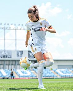 a female soccer player in action on the field