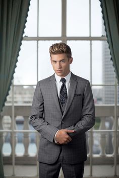 For a modern and updated look, choose the Grey Plaid Hamilton Suit by Ike Behar. 🤩 With its subtle pattern, it's guaranteed to liven up your look! 💯 Khaki Suit, Types Of Suits, Paisley Jacket, Subtle Pattern, Stylish Jeans, Plaid Suit, Dress Appropriately