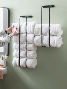 Explore the Ultimate Small Bathroom Hacks: Maximize Your Space with Toilets That Double as Sinks, Over-the-Door Storage Solutions, and many more ingenious ideas that will help you make the most of every square inch in your compact bathroom. Rolled Towels, Metal Towel Racks, Wall Towel Racks, Mounted Towel Rack, Powell Furniture, Bathroom Hacks, Small Space Bathroom, Wall Mounted Towel Rack, Compact Bathroom