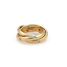 Cartier Trinity Diamond 18k Yellow Gold Rolling Band Ring Size 47-US 4.25 Cartier Trinity Diamond 18k Yellow Gold Rolling Band Ring Size 47-US 4.25 Description   Elite elegant by Cartier from the TRINITY collection. This triple band interlaced rings are crafted from 18k yellow gold with a fine polished finish. Each band has 6 round cut 2 points each sparkling diamond set around the entire ring. It is signed by the designer with the ring size, serial number and metal content. Material:  18k yellow gold Hallmark:  Cartier 750 47 1995 D04109 Diamond:  36 points   Color: F    Clarity: VS1 Measurements:  each band is: 2.7mm wide Ring Size:  US: 4.25     European:  47 Weight:  8.9 grams Stock#  55031     Click images to enlarge Payment   We accept payments through Paypal. We only ship to PayPal Cartier Triple Ring, Cartier Wedding Band Stack, Cartier Ring Stack, Trinity Cartier, Cartier Wedding Band, Cartier Wedding Bands, Cartier Wedding Rings, Cartier Trinity Ring, Ballerina Ring