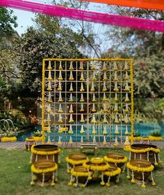 an outdoor area with yellow and white decorations