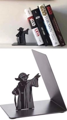 a shelf with some books on it and an image of yoda in the middle