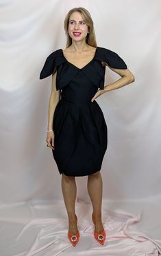 "Gorgeous 1970s black dress by Vera Mont. Dramatic but in minimalist fashion. No composition label, but knowing and selling Vera Mont for a while, I think it is acetate that is main material here. Blend is matte, pleasant to touch and in deep black colour. Dress is fully lined and features back zip closure. It has fitted bodice and structured tulip style skirt with lovely volume to it. The star of the show is of course the unusual, dramatic collar. Dress is in perfect condition, zero flaws, bare Black Colour Dress, Dramatic Collar, Black Tulips, Tulip Dress, Style Skirt, 70s Vintage, Black Colour, Deep Black, Style Expert