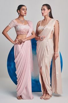 Ivory pre-draped saree in a pleated base. Comes with padded sequin cutdana embellished blouse. - Aza Fashions Pre-draped Fitted Blouse Piece For Wedding, Fitted Wedding Blouse Piece Pre-draped, Pre-draped Wedding Sets, Fitted Pre-draped Wedding Blouse Piece, Wedding Pre-draped Fitted Blouse Piece, Fitted Draped Blouse For Wedding, Draped Saree, Drape Saree, Embellished Blouse