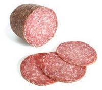 three slices of salami on a white background