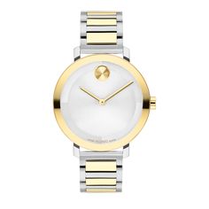 The Movado Bold Evolution ladies' dress watch is a true testament to both modern innovation and timeless design. With its stylish silver- and gold-tone ion-plated stainless steel bracelet, 34MM case and elegant silver dial, this timepiece exudes sophistication and classic style. In addition, reliable Swiss quartz movement assures precise and accurate timekeeping, while a K1 crystal offers superior scratch resistance. And with 50-meter water resistance, this timepiece can withstand splashes and b Modern Quartz Watches For Anniversary, Modern Watches With Polished Finish For Work, Modern Polished Watches For Work, Modern Polished Finish Watches For Work, Modern Anniversary Watches With Metal Dial, Modern Yellow Gold Jewelry With Subdials, Modern Jewelry And Watches For Anniversary, Modern Gold Jewelry And Watches, Modern White Gold Jewelry With Diamond Hour Markers