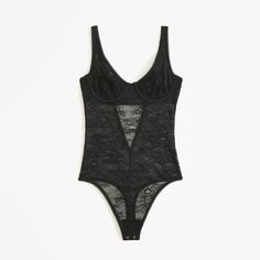 Our new bodysuit in a sheer vintage lace fabric, with mesh lining at underwire cups for shape and fit, adjustable straps, hook-and-eye back closure and two-snap bottom closure.