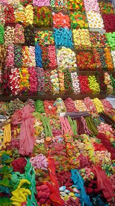 many different colored candies are on display