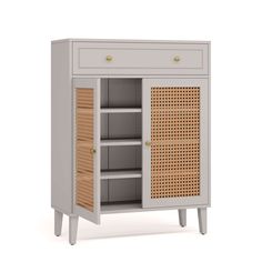 an open cabinet with wicker doors and drawers on the bottom, in front of a white background