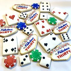 cookies decorated with playing cards and chips