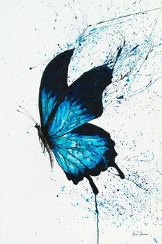 a blue butterfly is flying in the air