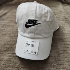 Sportswear Heritage 86 Unisex White Cap/Hat From Nike New, Never Worn One Size Casual Cotton Sports Baseball Cap, Nike Cotton Baseball Cap, Nike Casual Baseball Cap With Curved Bill, Nike Sporty Baseball Cap For Sports, Nike Sporty Baseball Cap, White Letter Print Baseball Cap For Streetwear, Urban Cotton Baseball Cap For Sports Events, Spring Sports Baseball Cap With Letter Print, Cotton Dad Hat For Sports, Spring