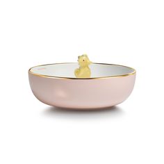 a pink bowl with a yellow rubber ducky in the center on a white background