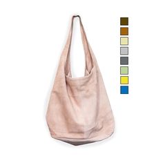 Looking for an ethically made and sustainably sourced suede leather hobo bag? Look no further than Riddle Cloth. Our bags are made with love in Italy and designed to be both simple and functional. Choose from a range of colors to find the perfect match for your personal style. Our commitment to ethical and sustainable practices means that you can feel good about your purchase. Shop now and discover why our suede leather hobo bag will quickly become your new favorite accessory. Internal capacity is approximately 12 inches tall x 16 inches wide x 6 inches deep. 8 inch strap drop. Features a partial zip enclosure. No lining, no pockets. 100% Suede Leather Made in Florence, Italy Slight variations may occur due to the use of natural materials. However, we strive to provide you with a product t Hobo Shoulder Bag With Suede Lining, Suede Hobo Shoulder Bag With Zipper Closure, Hobo Bag With Zipper Closure For On-the-go, Suede-lined Hobo Shoulder Bag For Shopping, On-the-go Hobo Bag With Snap Closure, Love In Italy, Slouchy Tote, Dusky Blue, Hobo Bags