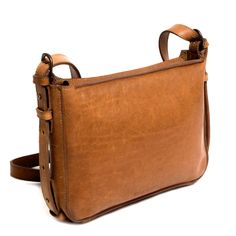 "Best bag I’ve ever had. It’s just the right size, and the leather is buttery soft. Would recommend to anyone looking for a high quality purse at a great price." - Mary H., Ellington Leather Crossbody Purse customer Our Ellington Leather Crossbody Purse is perfect for your daily use or a night out. This lightweight and compact full grain leather shoulder bag opens to include an interior hanging leather zipped pocket for organization. Closes securely with a smooth, antique metal YKK zipper. Detai Classic Soft Leather Shoulder Bag For Errands, Classic Crossbody Shoulder Bag For Errands, Classic Soft Leather Bag For Errands, Classic Cognac Shoulder Bag For Errands, Classic Cognac Bags For Errands, Antique Brass Metal, Leather Industry, Leather Crossbody Purse, Ykk Zipper