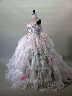 a dress made out of plastic bags on a mannequin