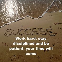 a message written in the sand that says, work hard, stay discipped and be patient your time will come