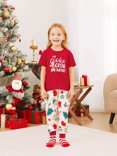 Get into the festive mood with our matching family Christmas pajamas! Embrace the holiday spirit with your favorite people and pets in our comfortable and cozy Gingerbread-themed sleepwear.
* Please add each size separately to your shopping cart.
* Each size includes 1 set of pajamas (1 top+1 bottom), or 1 romper, or 1 pet bandana.
* For children's safety, pajamas should be snug-fitting or flame-resistant. These kids' and babies' pajamas are flame-resistant.
* Gingerbread-themed print with THE Cookies CREW DADA/MAMA/MINI on the adults' and kids' pajamas.
* Drawstring and pockets on all pajama pants.
* Round neckline.
* Short sleeves.
* Suitable for home, leisure, and Christmas party.
* Regular fit.
* Medium length.
* Imported product sold by PatPat.
* Reliable supplier. Casual Christmas Sleepover Sets, Gingerbread Family Pajamas, Holiday Family Matching Loungewear Sleepwear, Christmas Matching Pajamas Families Short Sleeves, Cotton Christmas Sleepwear For Sleepovers, Family Matching Holiday Festive Sleepwear, Family Matching Christmas Sleepwear, Red Family Matching Holiday Sleepwear, Family Red Ans White Pjs