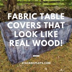 an old wooden box with the words fabric table covers that look like real wood on it