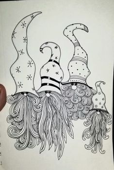 a drawing of three gnomes sitting on top of each other with stars and swirly hair