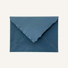 an envelope with blue paper on it