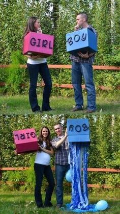 two people holding up boxes with the words girl and boy written on them in different languages