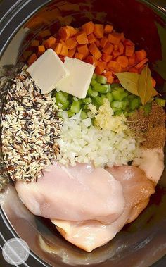 an assortment of vegetables and meat in a bowl