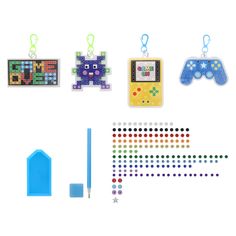 an assortment of toys and magnets on a white background, including a video game controller