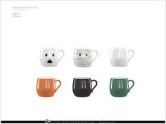 four different colored mugs with faces on them