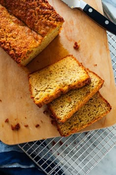 slices of banana bread sitting on top of a cutting board