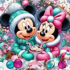 two mickey and minnie mouses eating cake together