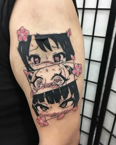 a woman's arm with an anime character tattoo on the left side of her body