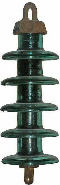 an old fashioned green metal bell on a white background