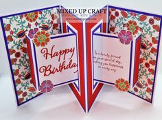 an open card with the words happy birthday written in red, white and blue on it