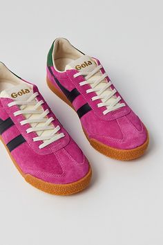 Classic Elan sneakers by Gola in a low top silhouette. Features a lace closure to the front and finished with a durable rubber sole. Features Classic court sneakers from Gola Lace-up style Content + Care Leather, suede, rubber Spot clean Imported Size + Fit Please note, these Gola shoes are sold in US women's shoe sizes | Gola Elan Sneaker in Fuchsia/Black/Evergreen, Women's at Urban Outfitters Cool Sneaker Outfits, Gola Shoes Woman, Colorful Adidas Shoes, Gola Elan Sneakers, Colored Sneakers Outfit, Women’s Fashion Sneaker, Cool Girl Shoes, 2024 Sneaker Trends Women, Fall Shoes 2024 Women