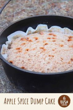 an apple spice dump cake in a cast iron skillet on the ground with text overlay