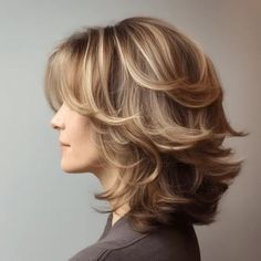 53 Flattering Medium-Length Haircuts for Women Over 40 Medium Length A Line Haircut With Layers, Chin Length Hair With Volume, Lots Of Layers Haircut Short, Blowout Layers Medium Length, Medium To Short Layered Haircuts, Med Layered Haircuts Round Faces, Short Layers For Medium Length Hair, Styling Medium Length Hair With Layers, Layered Flipped Hairstyles