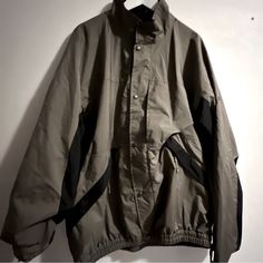 Jacket Is In Excellent Condition Looks New Maybe Never Worn.. Zip Pockets .. Full Zip.. See All Photos Vintage Winter Track Jacket For Outdoor, Winter Techwear Track Jacket In Khaki, Military Style Winter Sports Outerwear, Winter Military Sports Outerwear, Mens Golf, Black Green, Rain Jacket, Zip Pockets, Mens Jackets