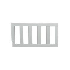 a white baby crib against a white background