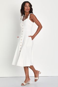 It's easy to envision a summer of ""amore"" in the Lulus Italian Romance White Ruffled A-Line Midi Dress With Pockets! Lightweight woven cotton shapes this simply adorable dress that has ruffled elastic straps and a darted bodice with a sweetheart neckline, all trimmed by matching ruffles. Decorative buttons accent the front, continuing across the fitted waist to the A-line midi skirt. Side seam pockets. Hidden zipper/clasp at back. Fit: This garment fits true to size. Length: Mid-calf length. B Cotton Summer Dresses For Daywear, Summer Cotton Daywear Dresses, Elegant Cotton Sundress For Vacation, Cotton Midi Dress For Summer, Feminine Cotton Sundress For Summer, Summer Midi Sundress For Daytime, Elegant Summer Sundress For Daytime, Elegant Cotton Sundress For Summer, Feminine Summer Dress For Daytime