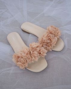 "Elegant slide flat sandals for casual and dressy look with added allover chiffon flowers. Simple and easy wear for brides, bridesmaids and/ or wedding parties. DETAILS: COLORS AVAILABLE: Ivory UPPER: Synthetic upper and lining MATERIALS: Mandmade outsole STYLE: EVELYN - Please see our \"Policies\" section for information regarding RETURNS and EXCHANGES. - Stay updated with latest news or promotion as we grow and follow us on the following outlets: Instagram: http://instagram.com/shop.kaileep Fa Bridesmaids Sandals, Flower Wedding Shoes, Bridesmaid Sandals, Ivory Bride, Flowers Simple, Closet Shoes, Flower Sandals, Bridal Sandals, Design Video