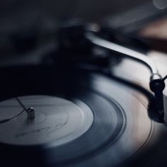 an old record player with its turntable spinning