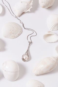 Our freshwater pearl drop leaf pendant is a beautiful addition to any collection. The texture in the sterling silver perfectly contrasts to emphasize the smooth freshwater pearl. This versatile piece can be dressed up or dressed down for any occasion. Elegant Pearl Jewelry, Pearl Drop Necklace, Leaf Pendant, Drop Necklace, Pearl Drop Earrings