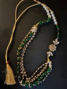 Indian Bridal Necklace Set with Earrings - Ideal for Mehndi, Sangeet, Weddings, Baby Showers, Festivals, Teej, Sindhara, Diwali, and Rakhi. This elegant set features green and gold hues with pearls and Kundan accents, perfect for any special occasion. Elegant Green Kundan Necklace For Festive Occasions, Elegant Kundan Necklace With Latkans For Diwali, Green Latkans Necklace For Party, Green Necklaces With Latkans For Party, Elegant Kundan Necklace With Gold Beads For Diwali, Elegant Kundan Necklace With Latkans For Party, Festive Formal Kundan Necklace With Round Beads, Elegant Kundan Necklace With Round Beads For Formal Occasions, Elegant Green Kundan Necklace With Latkans