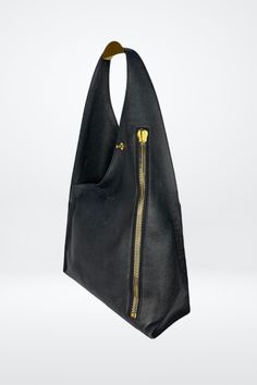 Tom Ford Large Single Strap Hobo Bag w Gold Hardware – Kit's Boutique Black Bucket Bag With Gold-tone Hardware For Business, Black Business Bucket Bag With Gold-tone Hardware, Luxury Everyday Hobo Bag With Zipper Closure, Luxury Hobo Bag With Zipper Closure For Everyday, Designer Hobo Tote Bag With Zipper, Luxury Hobo Bag With Gold-tone Hardware For Travel, Luxury Evening Hobo Bag With Zipper Closure, Luxury Evening Bags With Zipper Pocket, Luxury Rectangular Hobo Bag With Zipper Closure