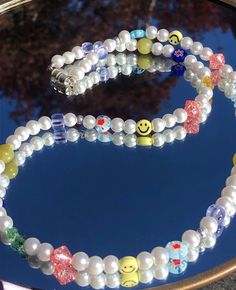 ✿ Happy! Smiley Face Trendy Necklace- cute smiley faces with various glass beads, glass pearls, and a silver closure (tarnish resistant!) ✿ 𝐀𝐛𝐨𝐮𝐭 𝐭𝐡𝐞 𝐏𝐫𝐨𝐜𝐞𝐬𝐬 I buy beads and wire from locally sources bead shops (including handmade glass beads) and then design and string all the necklaces. 𝐒𝐢𝐳𝐢𝐧𝐠 The sizes I offer currently are 16inch to 20 inch, however, I offer extended sizing to those who would prefer it; just place that information in the custom tab or send me a message : Smiley Face Yellow, Aesthetic Necklace, Happy Smiley Face, Cute Smiley Face, Trendy Necklace, Buy Bead, Trendy Aesthetic, Smiley Faces, Handmade Glass Beads