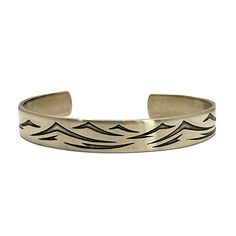 "Imagine yourself floating in gentle blue-green tropical waters or paddling the rapids of wild water with our Waves Cuff Bracelet. We etch the waves onto the cuff using our unique, acid-free etching process. The length of this cuff is 5.75\" and it is 1/2\" wide. All our cuffs are adjustable as they can be opened up or squeezed tighter. We can make other lengths as well, convo us for custom listing. Details Width: .5\" Length: 5.75\" Adjustable Matte silver or antique brass Handmade in Montana N Wild Water, Surf Bracelet, Fish Jewelry, Mens Cuff, Tree Necklace, Cuff Rings, Wave Pattern, Nature Jewelry, Leather Cuffs