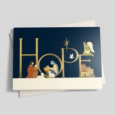 a christmas card with the word hope written in gold and blue, surrounded by nativity figures